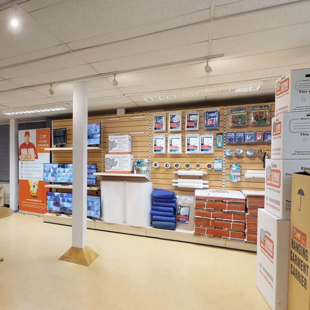 A spacious room filled with numerous boxes and shelves, showcasing Elephant Click & Store facilities.